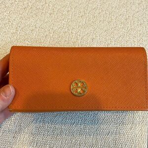 Tory Burch sunglass case.  Lined just the case!
